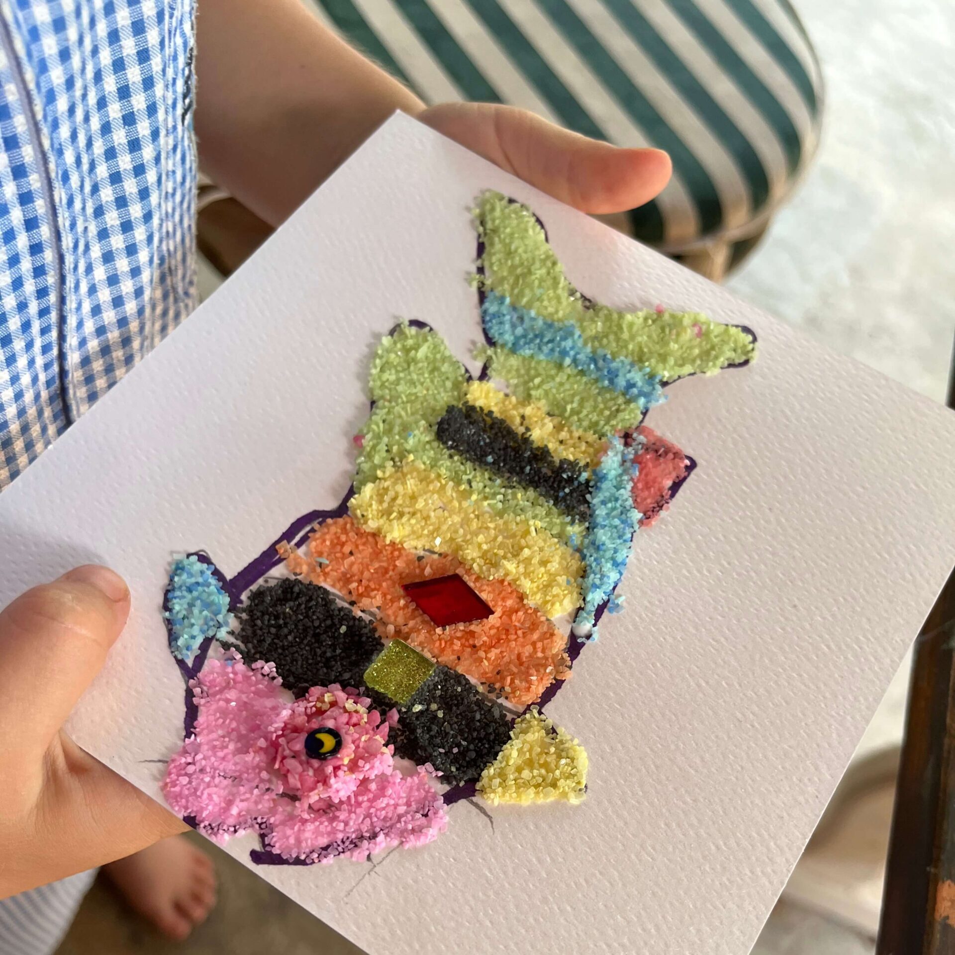 Fish sand art made in the arts and craft class at Turtle and Moon art studio.